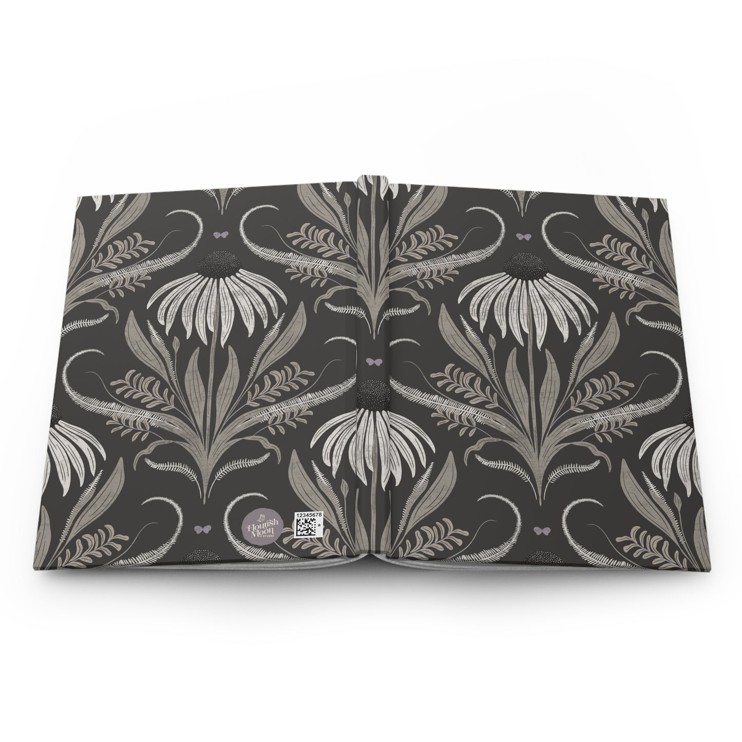 Floral journal open flat on a white background