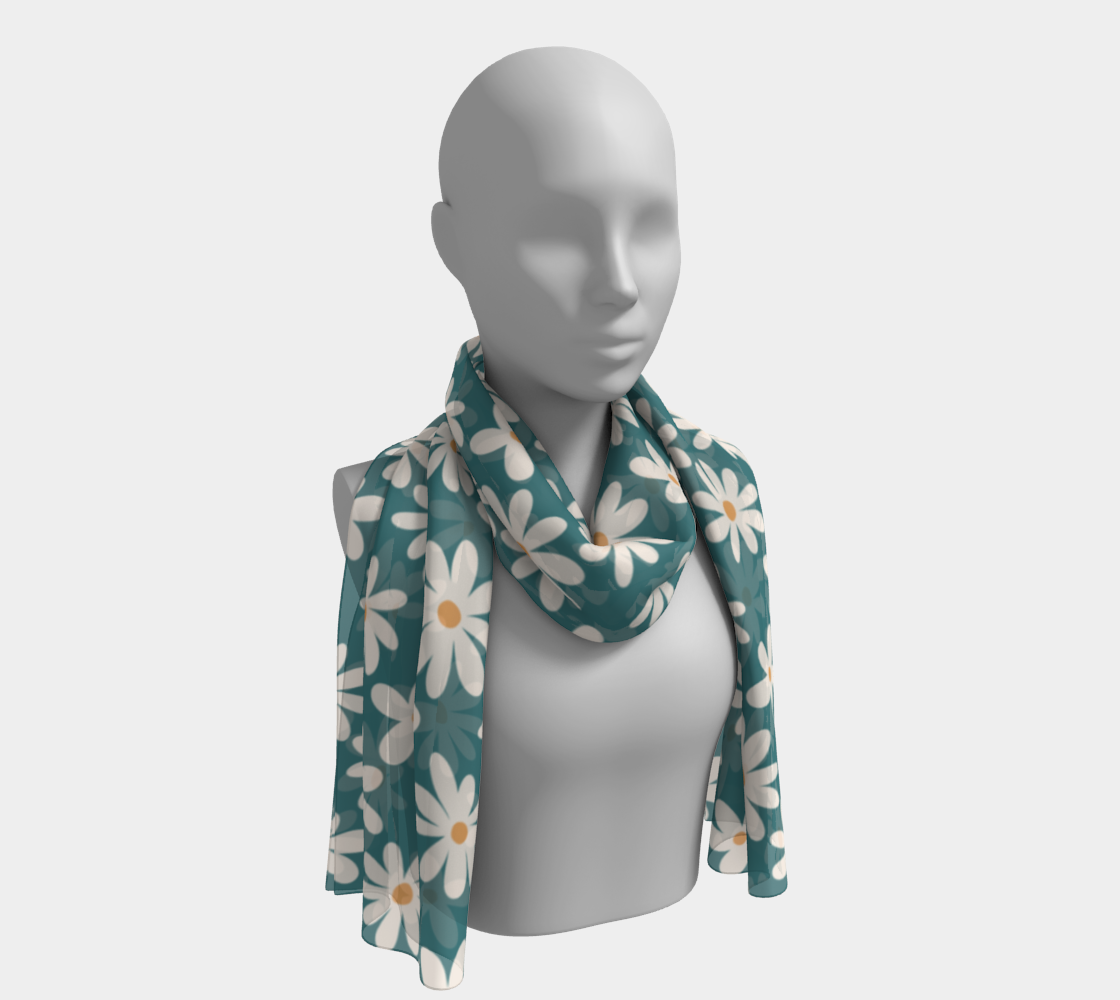 Mannequin wearing a teal scarf with cream floral patterns on a light gray background