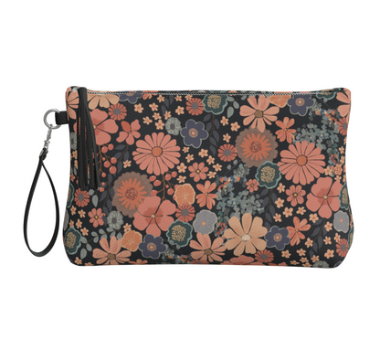 Floral patterned pouch with a strap on a light gray background