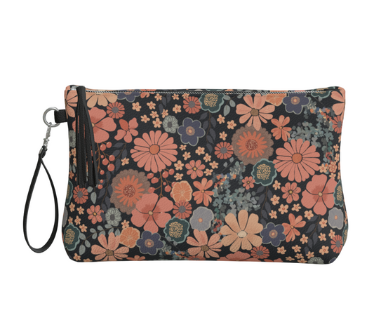 Floral patterned pouch with a strap on a light gray background