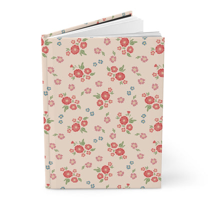 Floral patterned notebook on a white background
