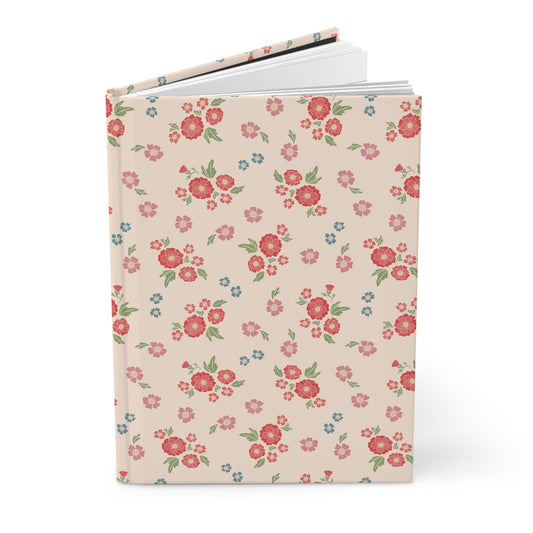 Floral patterned notebook on a white background