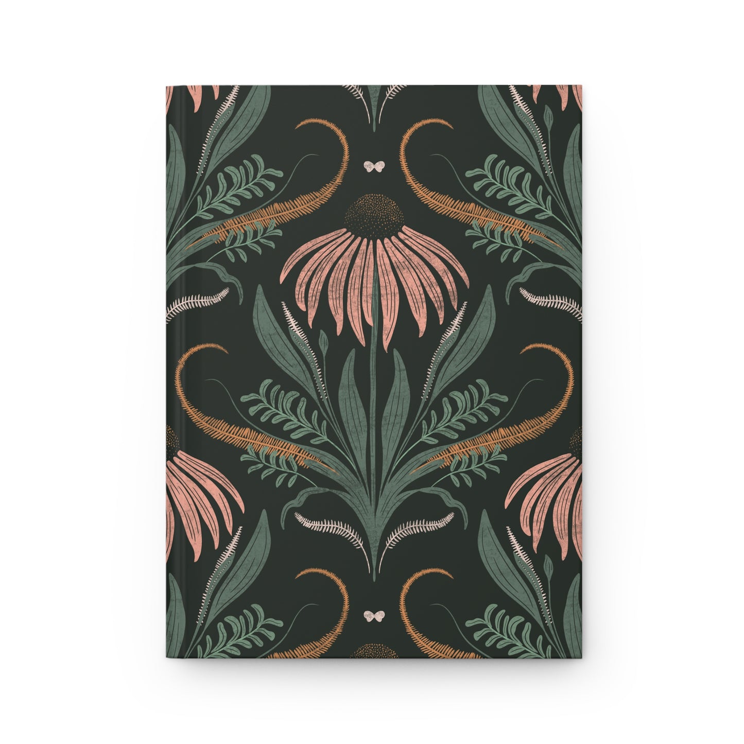 Notebook with floral and leaf pattern on a dark background