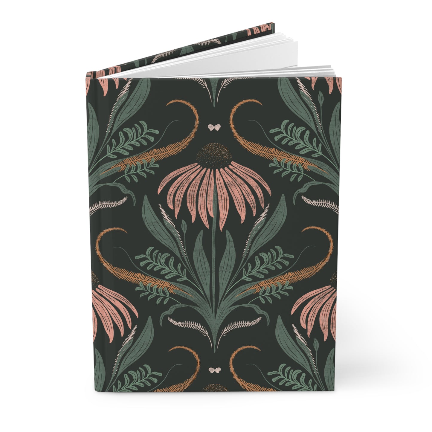 Notebook with floral and leaf pattern on a dark background