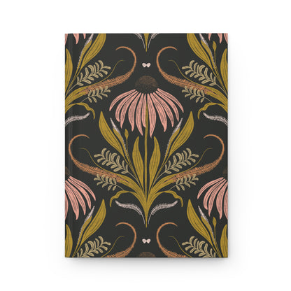 Floral patterned hardcover journal with pink flowers and green leaves on a black background