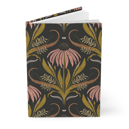 Journal with floral design on a black background